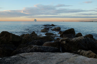 Scenic view of sea against sky during sunset