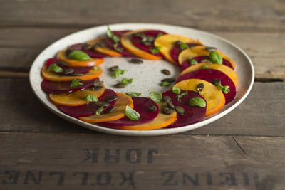 Close-up of fruit salad in plate on table