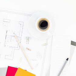 High angle view of coffee cup on table