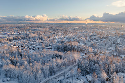 Suburban view from above with small houses and snow in espoo, finland