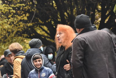 Group of people looking at trees