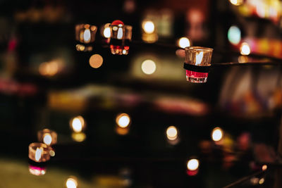 Close-up of lit tea light candles