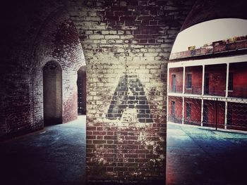 View of historic building seen through window