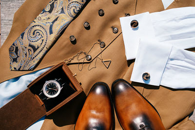 High angle view of personal accessories on table