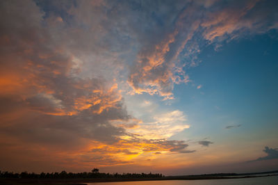 Low angle view of dramatic sky during sunset