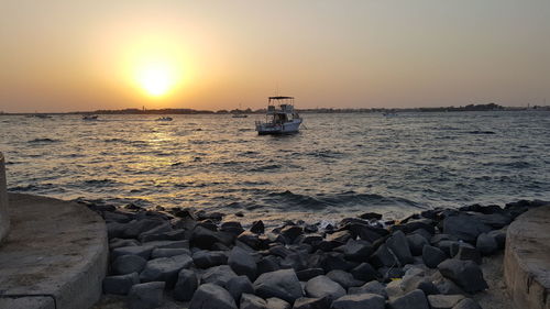 Scenic view of sea against sky during sunset