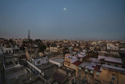 High angle view of townscape against sky at dusk