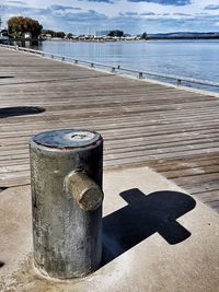 Shadow on sea shore against sky