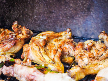 High angle view of meat on barbecue grill