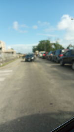 Road seen through car windshield