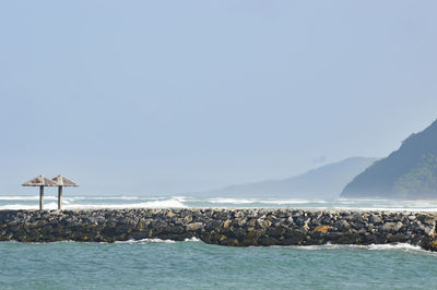 Scenic view of sea against clear sky