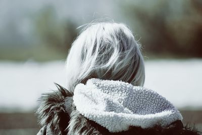 Rear view of woman in warm clothing