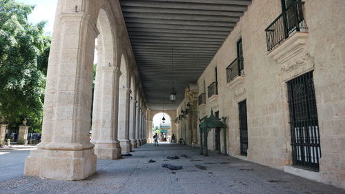 Alley amidst buildings in city