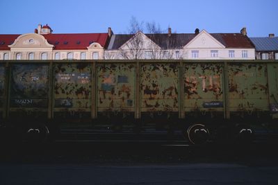 Graffiti on built structure against sky