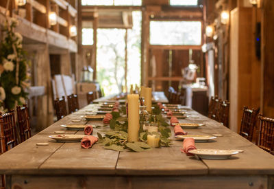 Plates arranged on table restaurant