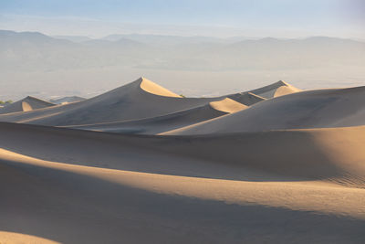 Scenic view of desert against sky