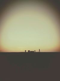 Scenic view of silhouette landscape against clear sky