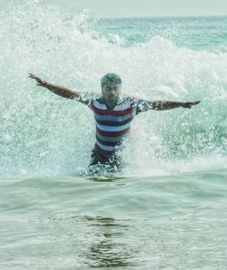 Full length of boy in sea