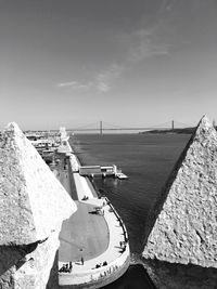 25 de abril bridge over tejo river against sky