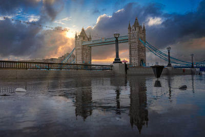 Iconic tower bridge view connecting london with southwark over thames river, uk.