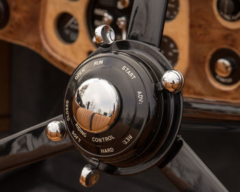 Close-up of vintage car steering wheel