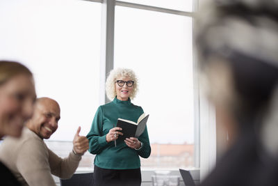 Businesswoman talking during business meeting