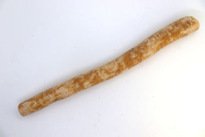 High angle view of bread on white background