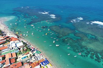 High angle view of sea and buildings