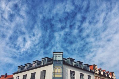 High section of building against cloudy sky