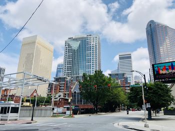 Modern buildings against sky in city