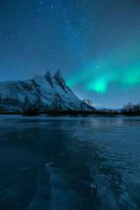 Beautiful northern lights above otertinden in nortjern norway.