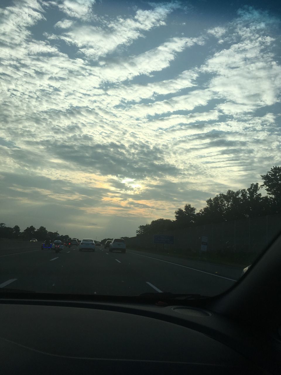 car, car interior, land vehicle, vehicle interior, cloud - sky, transportation, sky, windshield, mode of transport, road, car point of view, sunset, tree, dashboard, no people, nature, day, scenics, beauty in nature, outdoors, close-up