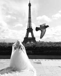 Low angle view of statue against cloudy sky