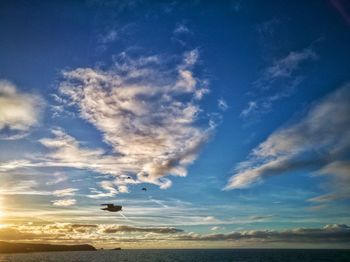 Low angle view of cloudy sky over landscape