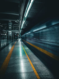 Illuminated railroad station platform