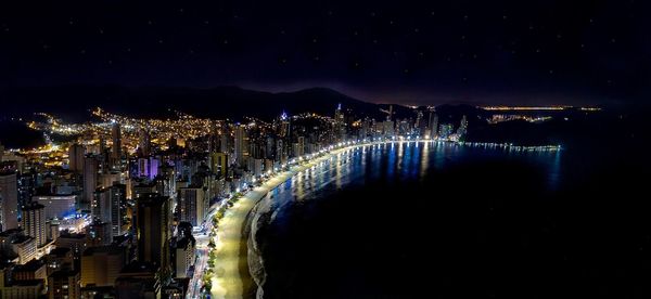 Aerial view of balneário camboriú waterfront lit up at night