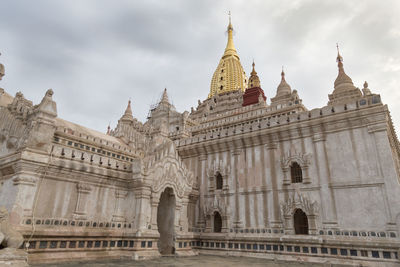 Golden tower, arches and columns of the ananda temple in old bagan,