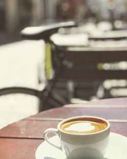 Close-up of coffee cup on table