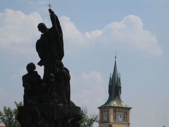 Low angle view of statue against sky