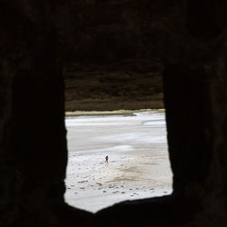 Silhouette of person on beach