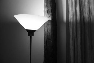 Lamp post in dark room