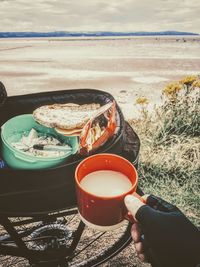 Person holding tea cup