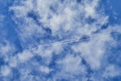 Low angle view of vapor trail in sky