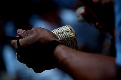 Close-up of man holding camera