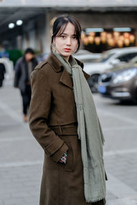 Young woman standing on street