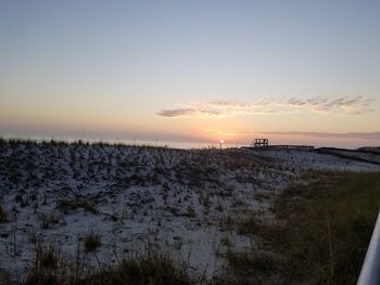 Scenic view of landscape against sky during sunset