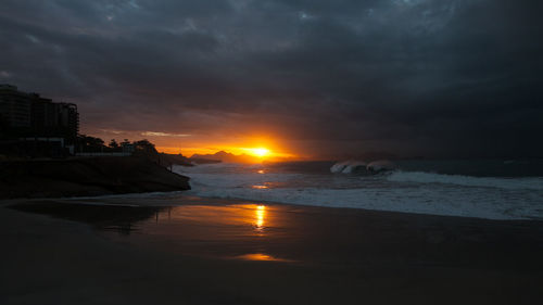 Scenic view of sea against sky during sunset