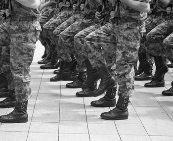 Low section of soldiers marching on street