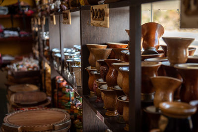 Bokeh of souvenirs shop in the road to los molinos reservoir with lots of argentinian typical mate