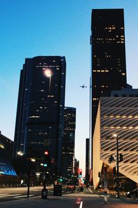 Low angle view of illuminated building at night